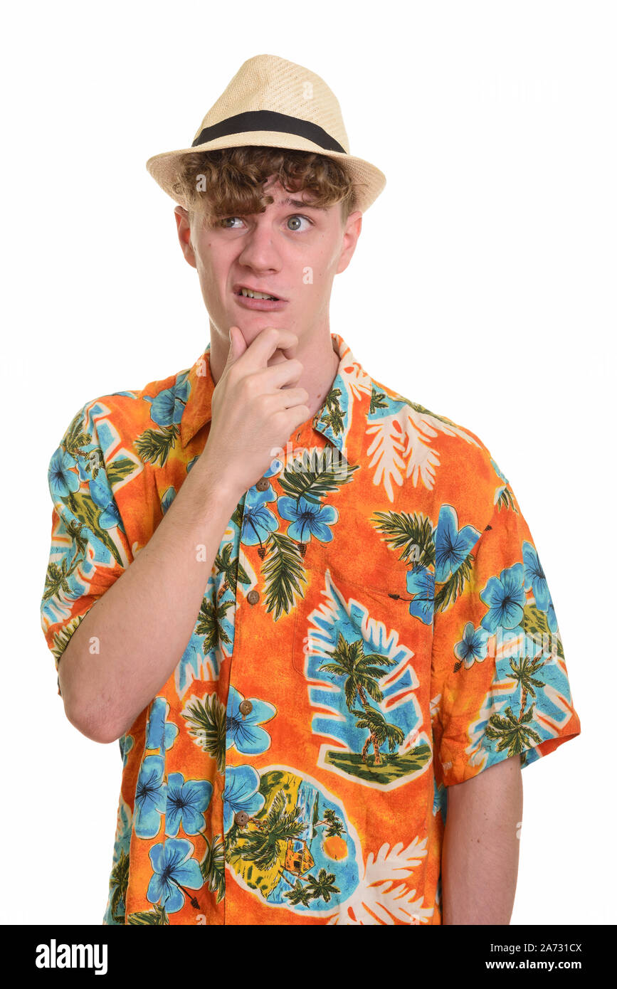 Junge touristische Mann mit Hut denken betont Stockfoto