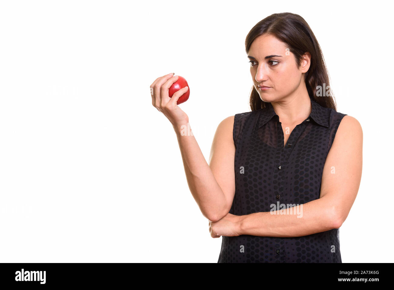 Porträt der jungen schönen Frau mit roten Apfel Stockfoto