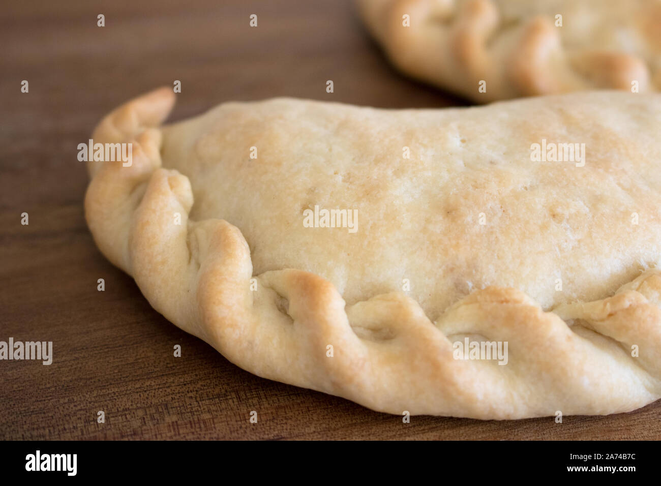 Essen Fotografie eines Südamerikanischen empanada Stockfoto
