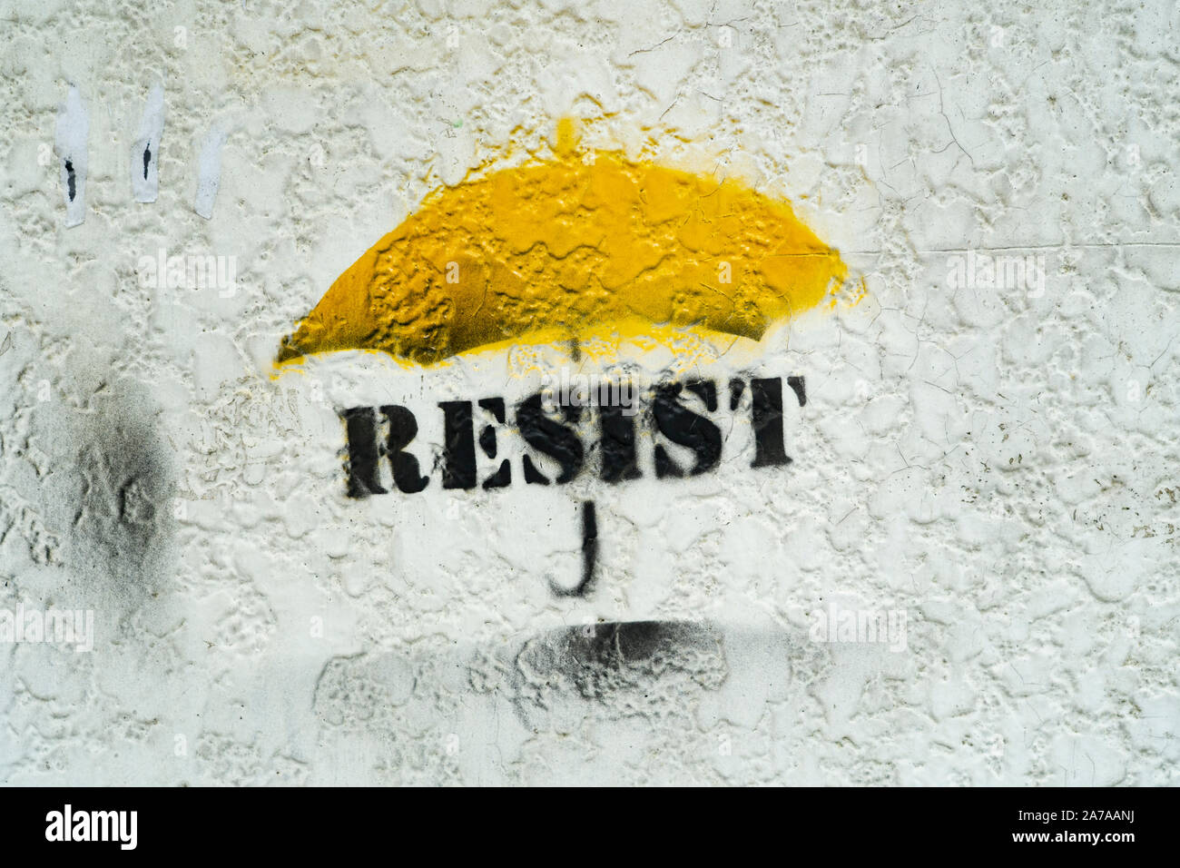 Schablone auf Wand mit pro-demokratischen Logo der in Hongkong widerstehen. Stockfoto