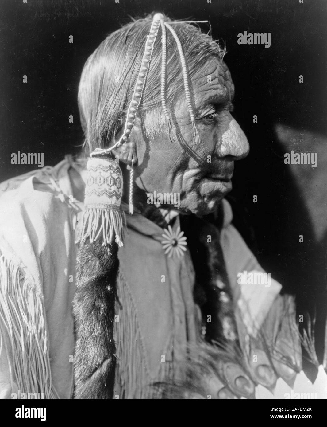 Edward S. Curits Native American Indians - Esipėrmi - Comanche Mann kann. 1927 Stockfoto