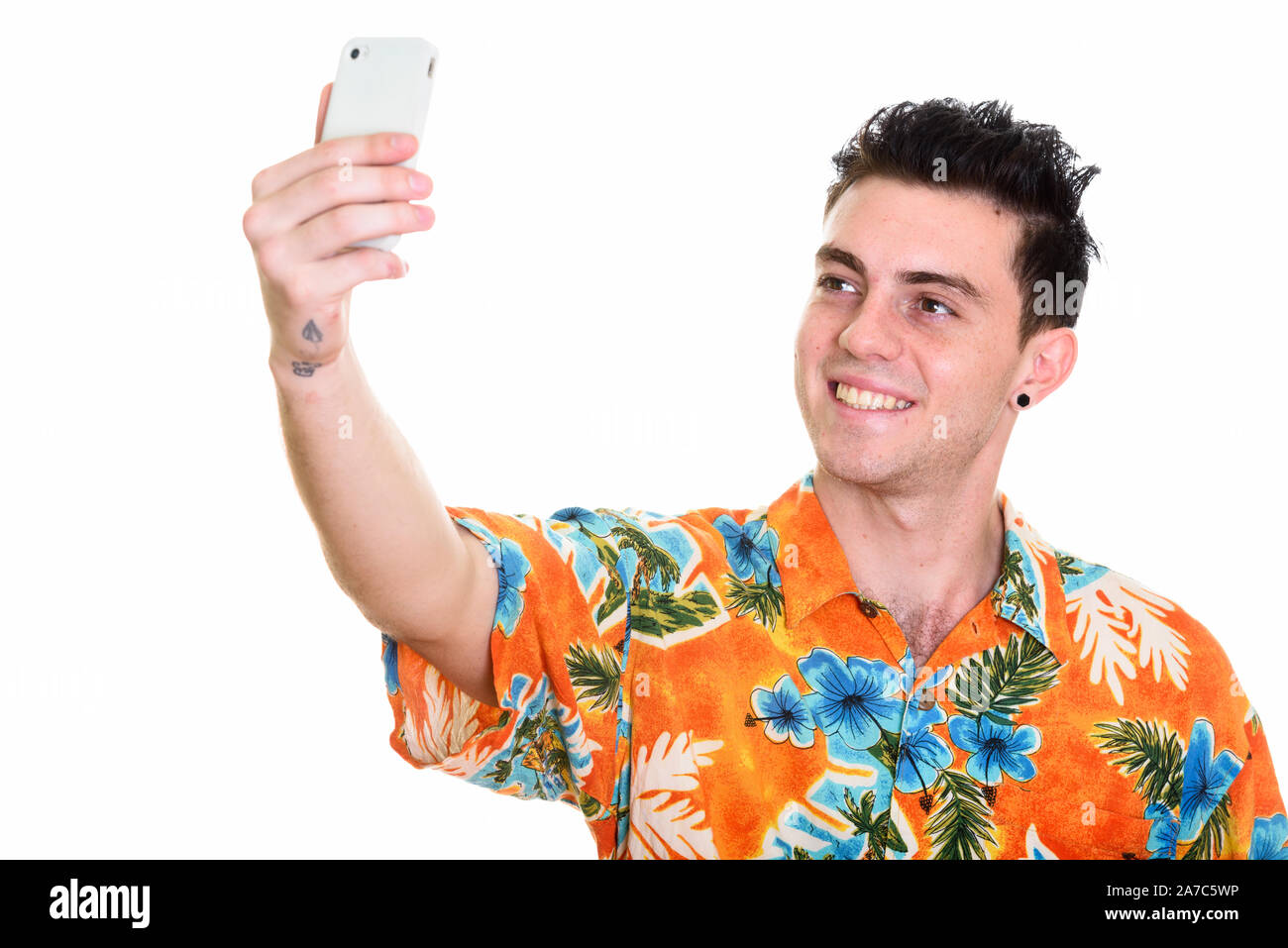 Studio shot der jungen schönen touristischen Mann bereit für Ferienhäuser Stockfoto