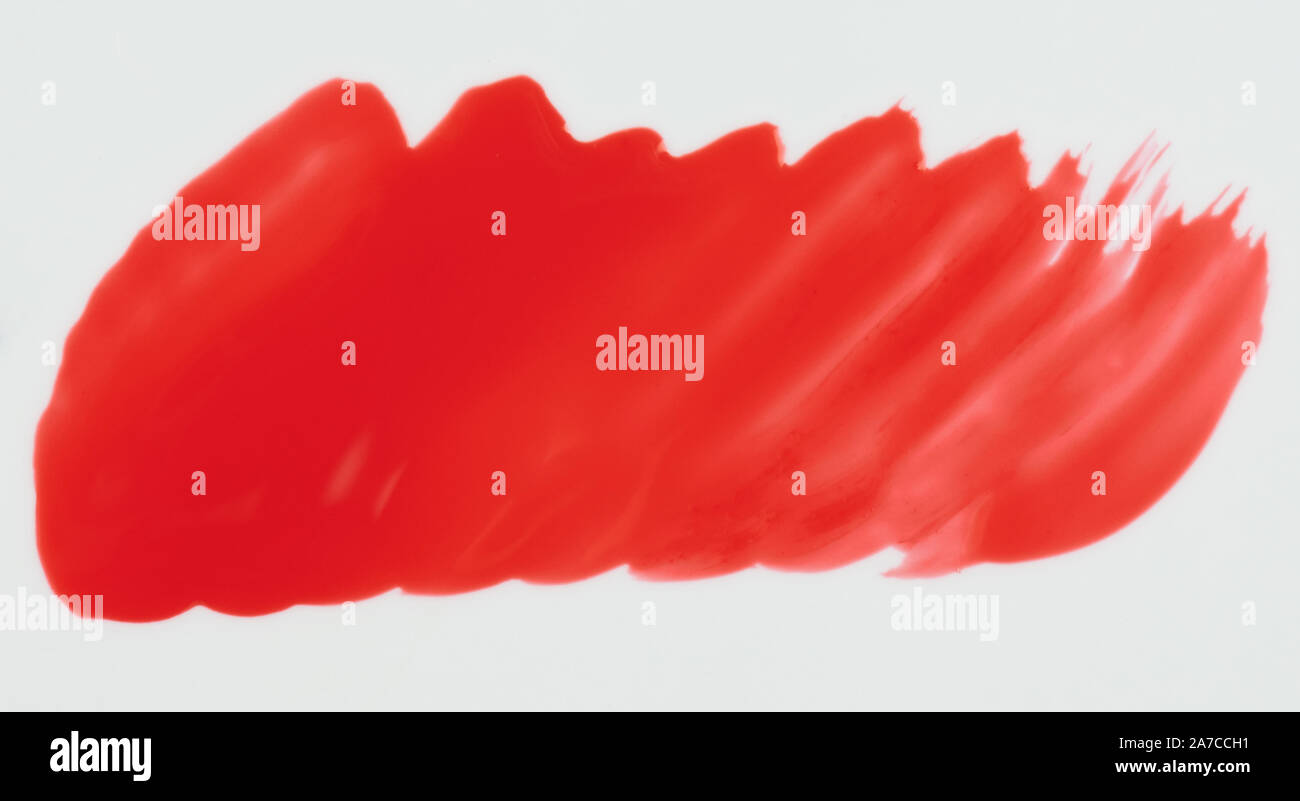 Rote Farbe Fleck auf weissem Hintergrund Nahaufnahme isoliert Stockfoto