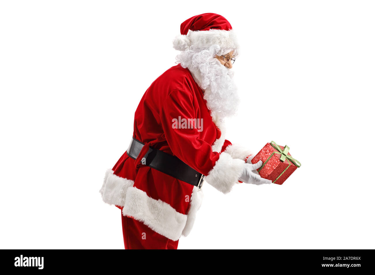 Santa ein Geschenk auf weißem Hintergrund Stockfoto