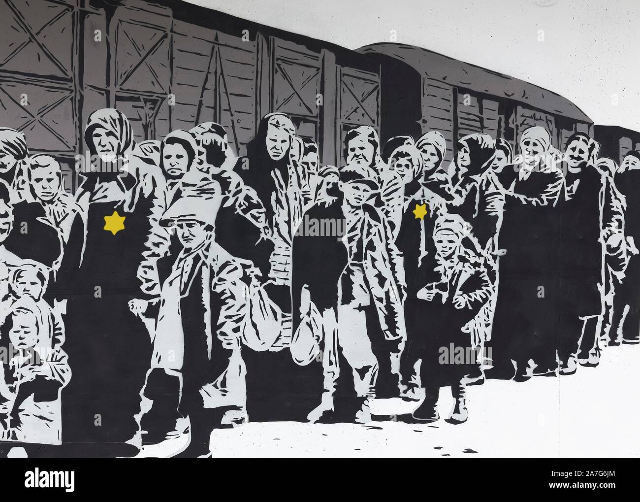 Spalte der Juden mit einem jüdischen Stern vor einem Güterwagen, Deportation, Holocaust, Wandmalerei von street artist Lücke, 40 Grad Urban Art Festival 2019 Stockfoto