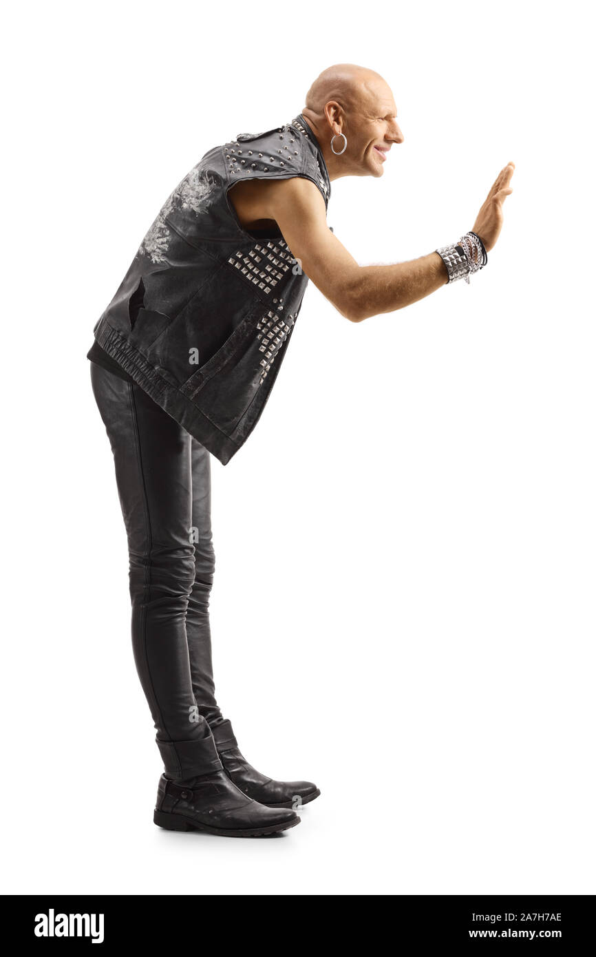 Volle Länge Profil Schuß eines männlichen Rock Star Gestik Höhe - fünf auf weißem Hintergrund Stockfoto
