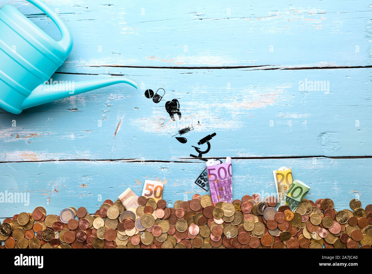 Gießkanne mit Symbolen und Währung Euro, Konzept der pharmazeutischen Unternehmen und Medizin Stockfoto