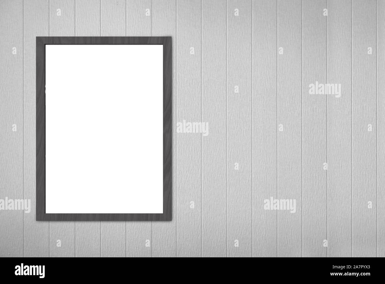 Leere leere weiße Mock up Bilderrahmen Board auf grau Holz Paneele Wand Hintergrund. Stockfoto