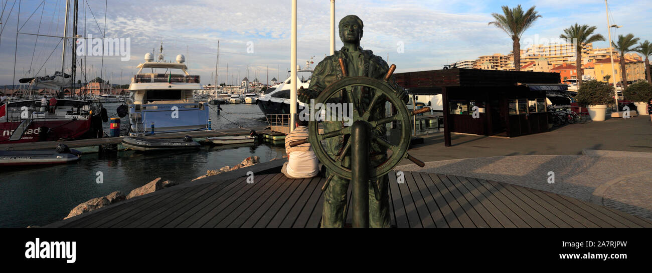 Bronzestatue der Steuermann, der Marina von Vilamoura, Algarve, Portugal, Europa Stockfoto