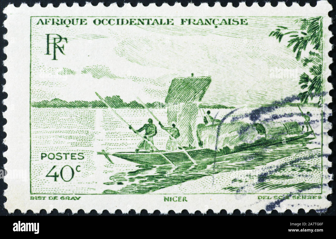 Flussschifffahrt auf afrikanischen Fluss auf alte Briefmarke Stockfoto