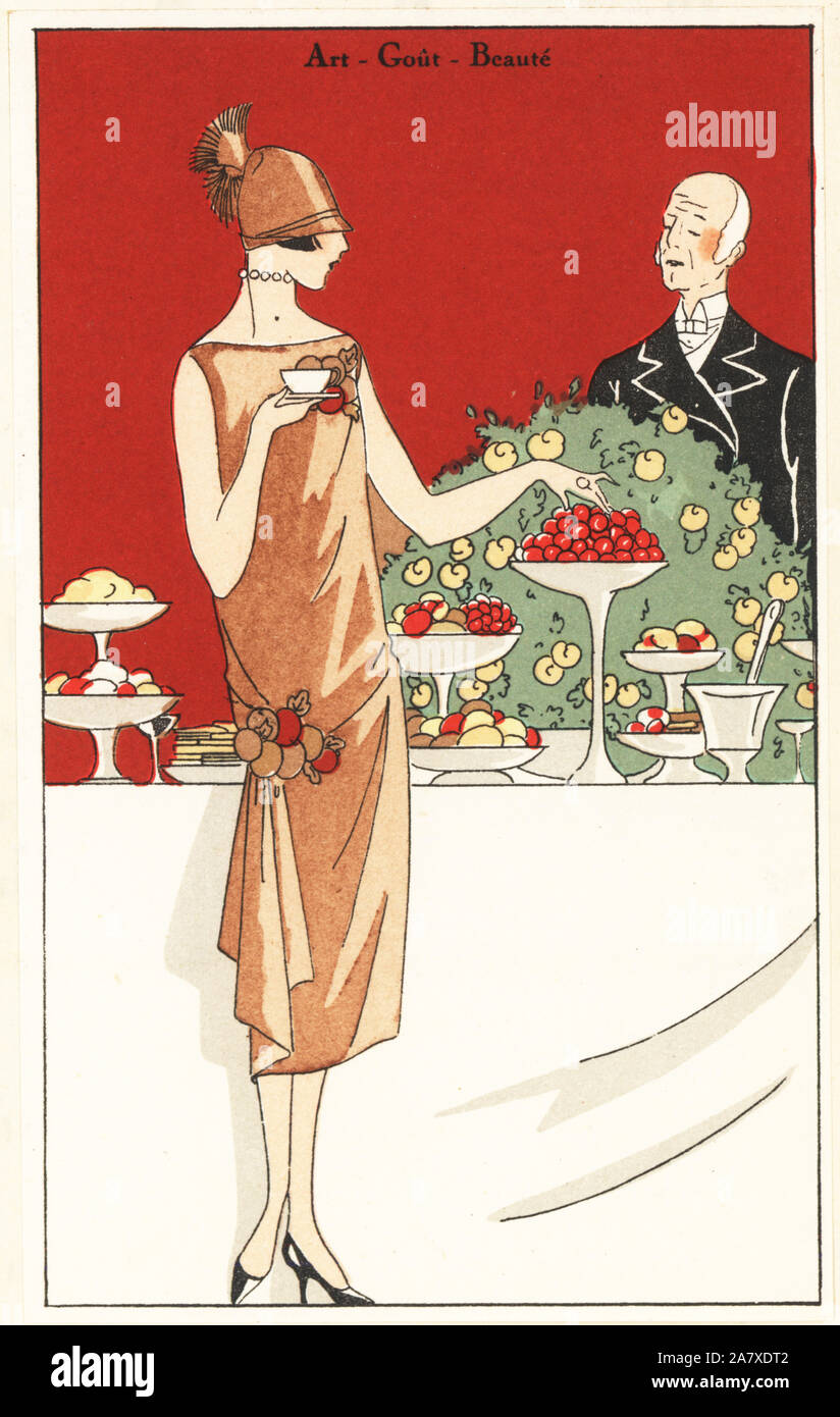 Frau an einem Frühstücksbuffet Tea Party tragen einen Nachmittag Kleid in Krepp bestickt mit Blumen Kameen. Papierkörbe pochoir (Schablone) Lithographie von der Französischen luxus Mode Magazin Kunst, Gicht, Beauté, 1925. Stockfoto
