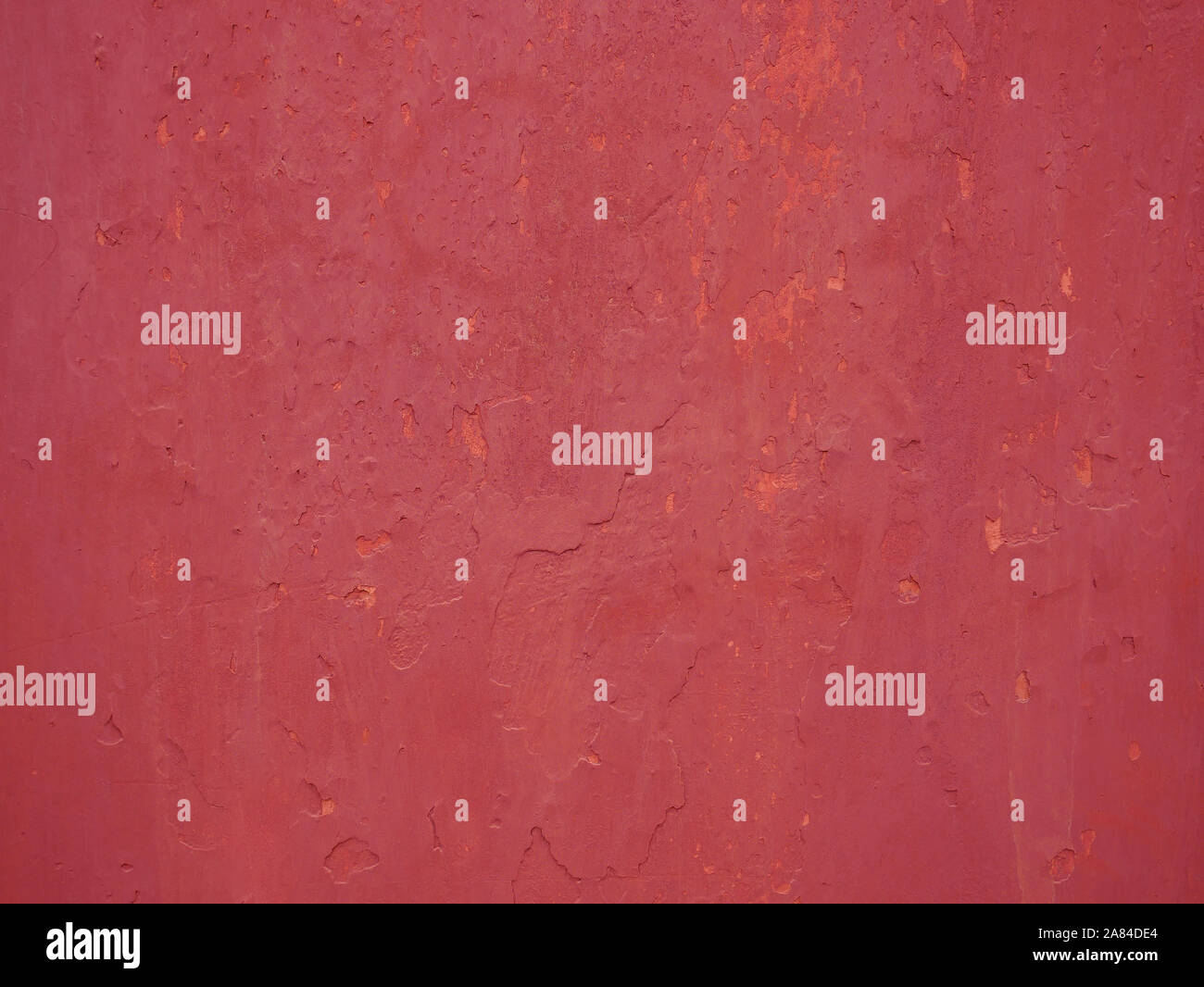 Detail der alte rot bemalten Wand Stuck, close-up Stockfoto