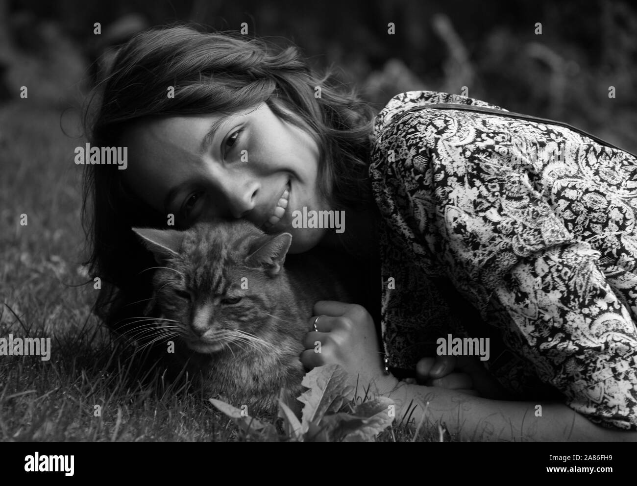 Ein Mädchen und ihre Katze Stockfoto