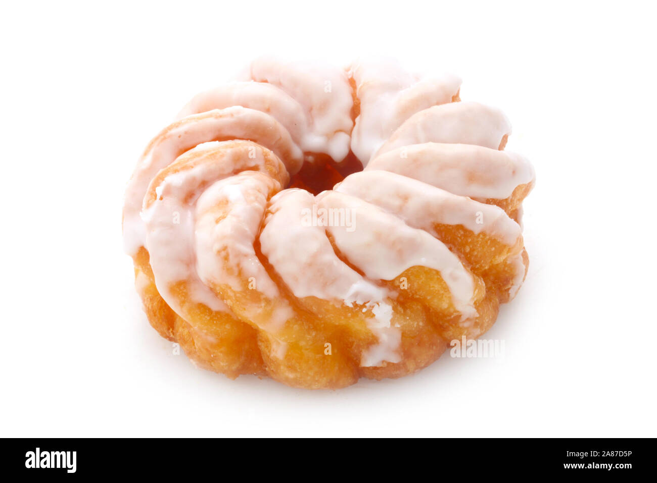 Französische Cruller isoliert auf weißem Stockfoto