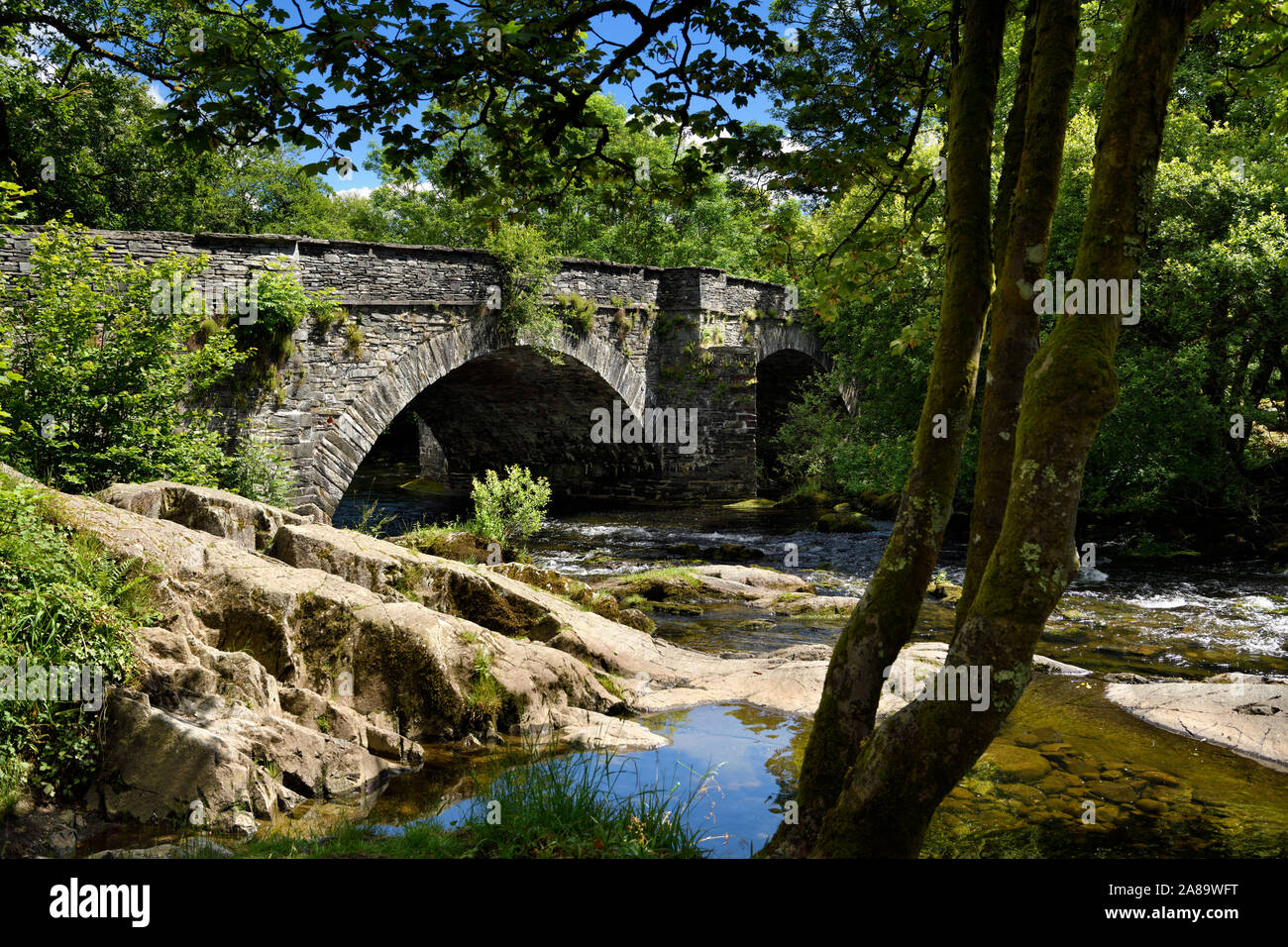 Skelwith Bridge über den Fluss Brathay in Skelwith Bridge village Lake District National Park England Stockfoto