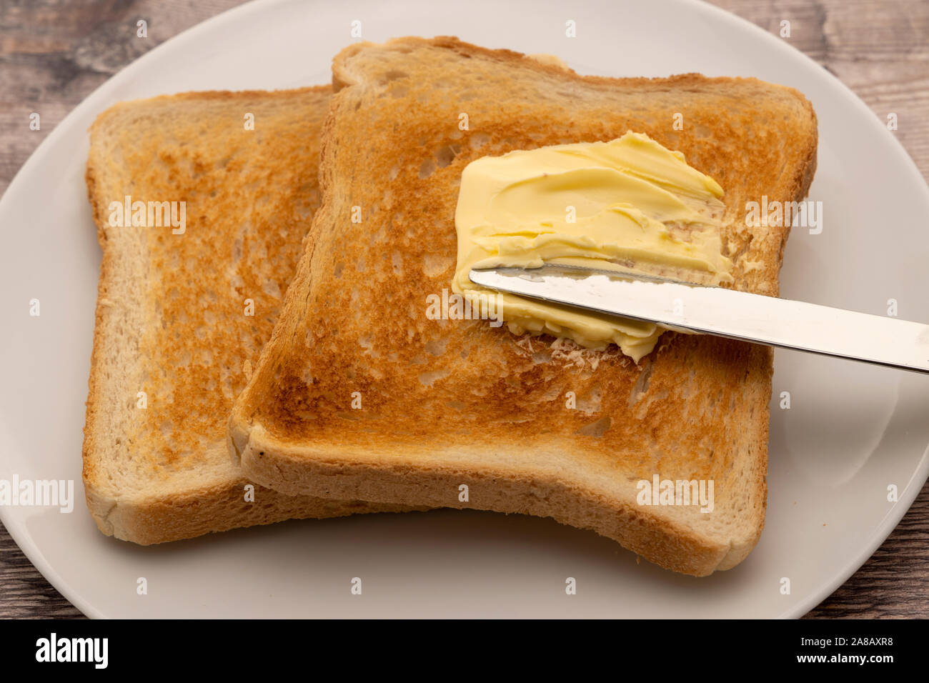 Zustimmen eine Scheibe Toast Stockfoto