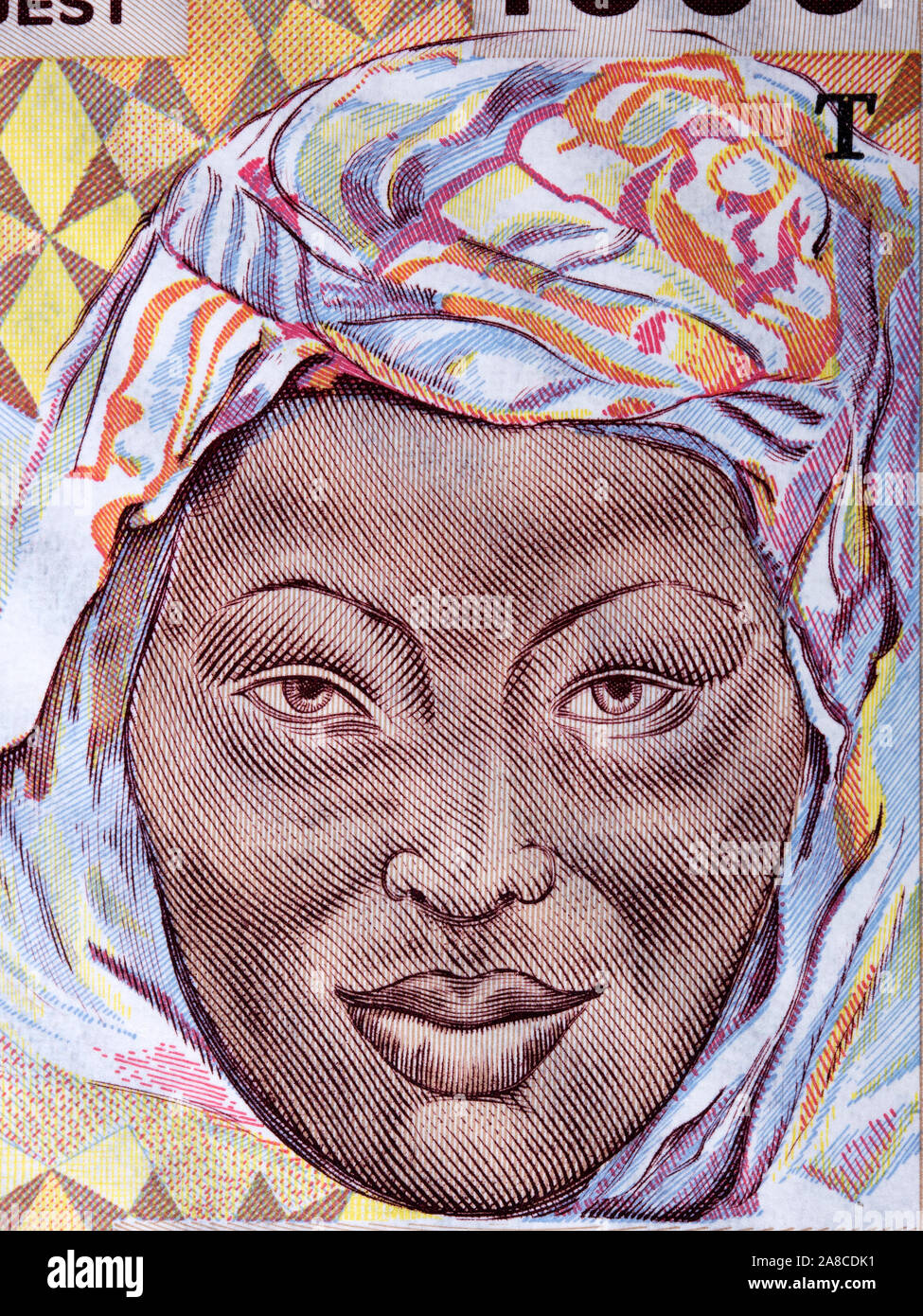 Junge Frau mit Kopftuch ein Porträt von alten Westafrikanischen Staaten Geld Stockfoto