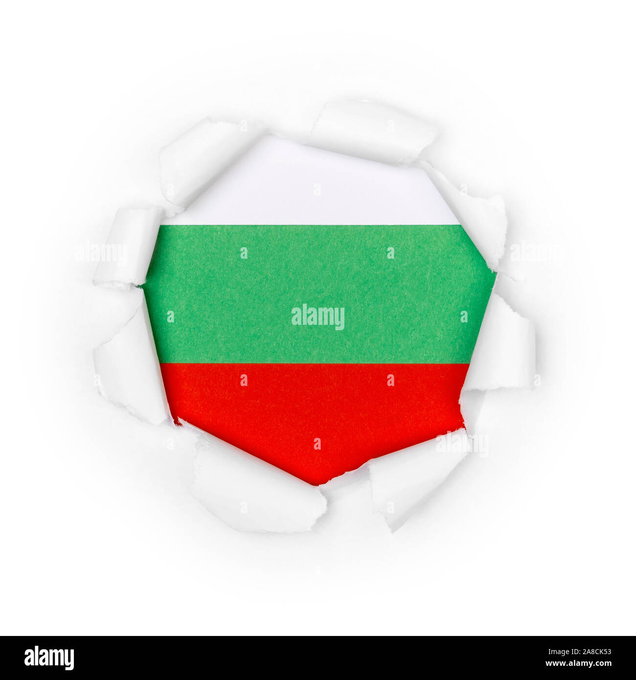 Blick auf die bulgarische Flagge durch den großen Durchbruch auf dem Papier. Stockfoto