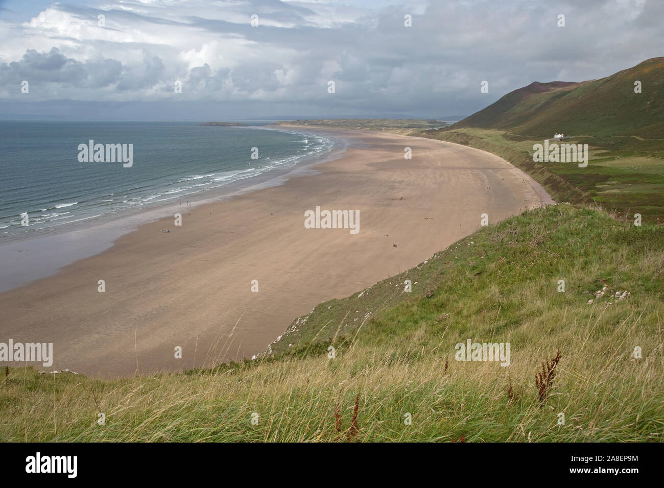 Einsame Sandstrand bei Ebbe, Rhossili, Gower, Wales, Großbritannien Stockfoto