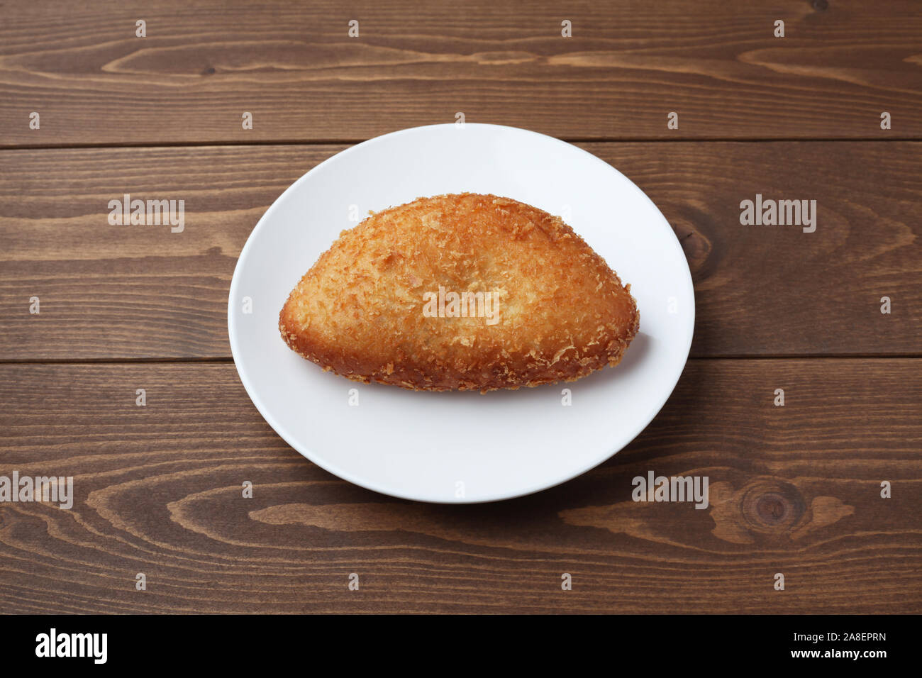 Curry Brot fried Roll auf Tisch isoliert Stockfoto