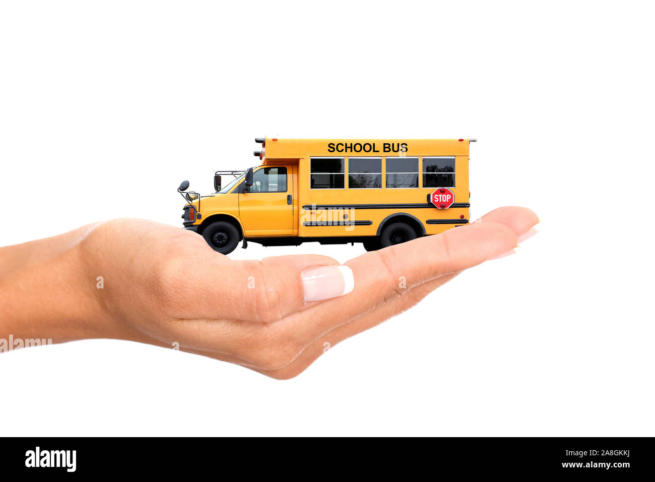 Hand mit Modellauto, 50mm, Schulbus, Oldtimer, Wertsteigerung, School Bus, Stockfoto