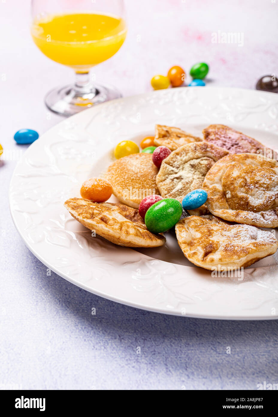 Niederländische poffertjes mini Pfannkuchen genannt Stockfoto