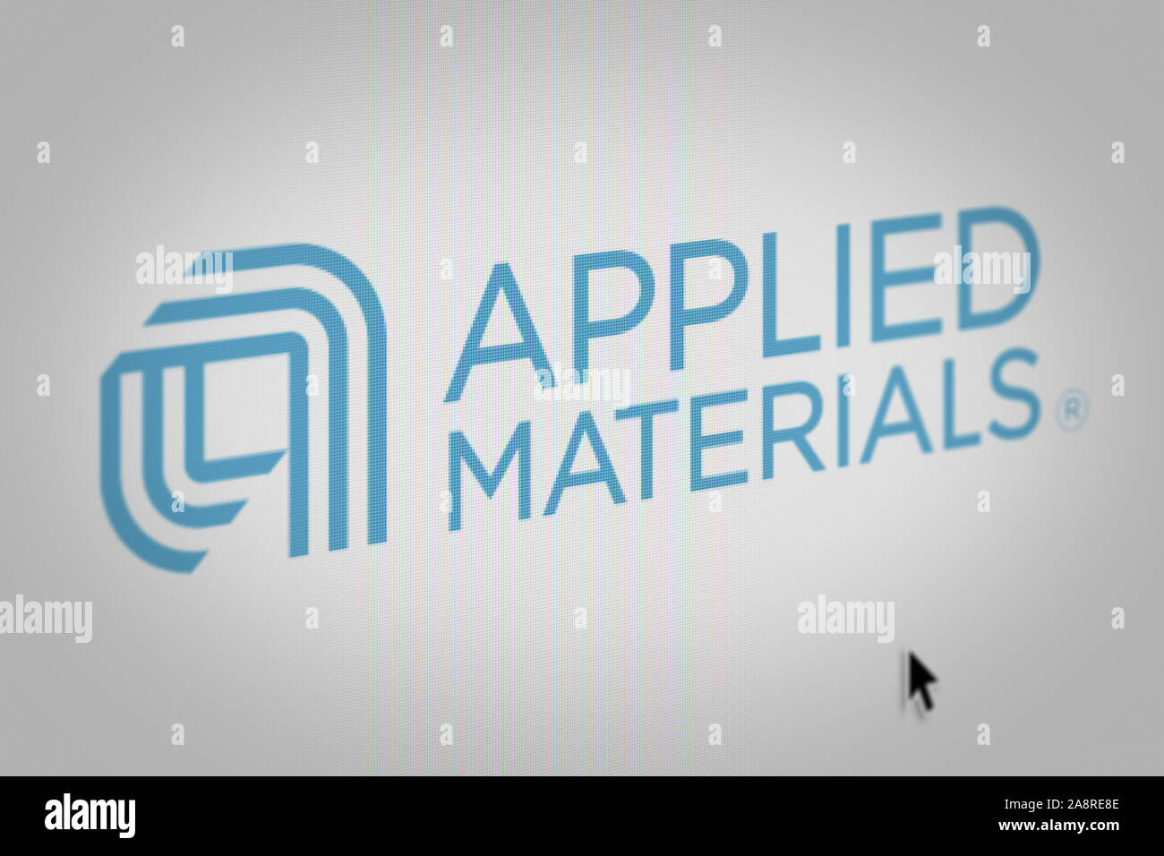 Logo der öffentlichen Unternehmen Applied Materials Inc. auf einem Bildschirm in der Nähe angezeigt. Credit: PIXDUCE Stockfoto