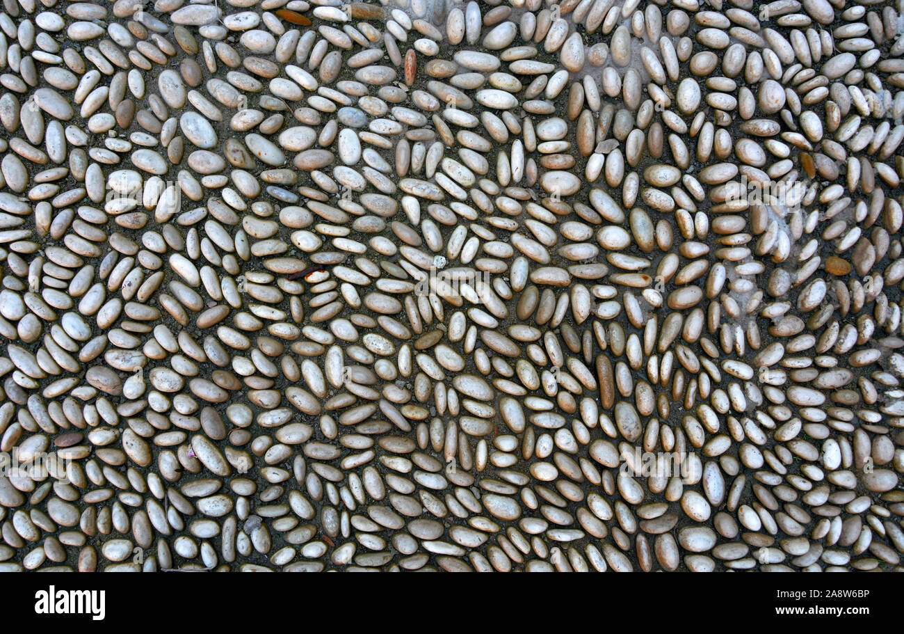 Kleine weiße steinigen Weg Hintergrund Textur. Stein, Kies Straße Ansicht von oben. Stockfoto