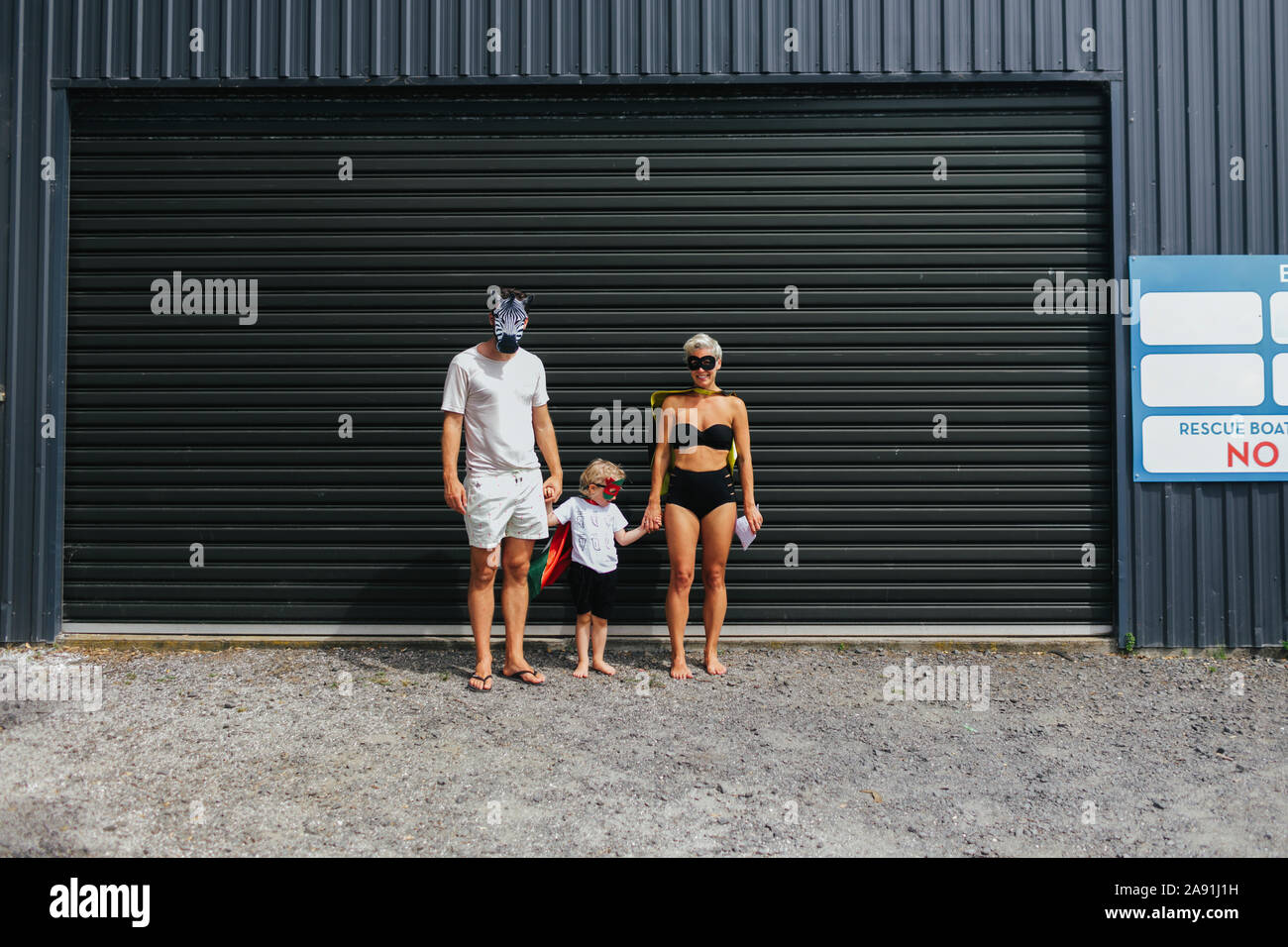 Familie tragen Masken Stockfoto