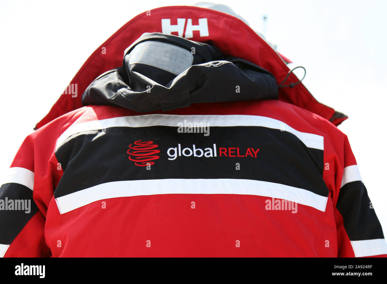 Helly Hanson Skijacke mit globalen Relais Branding, eine erfolgreiche Technologieunternehmen in Gastown, Vancouver, British Columbia, Kanada Stockfoto