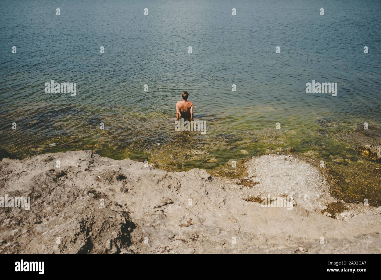 Mann im Meer Stockfoto