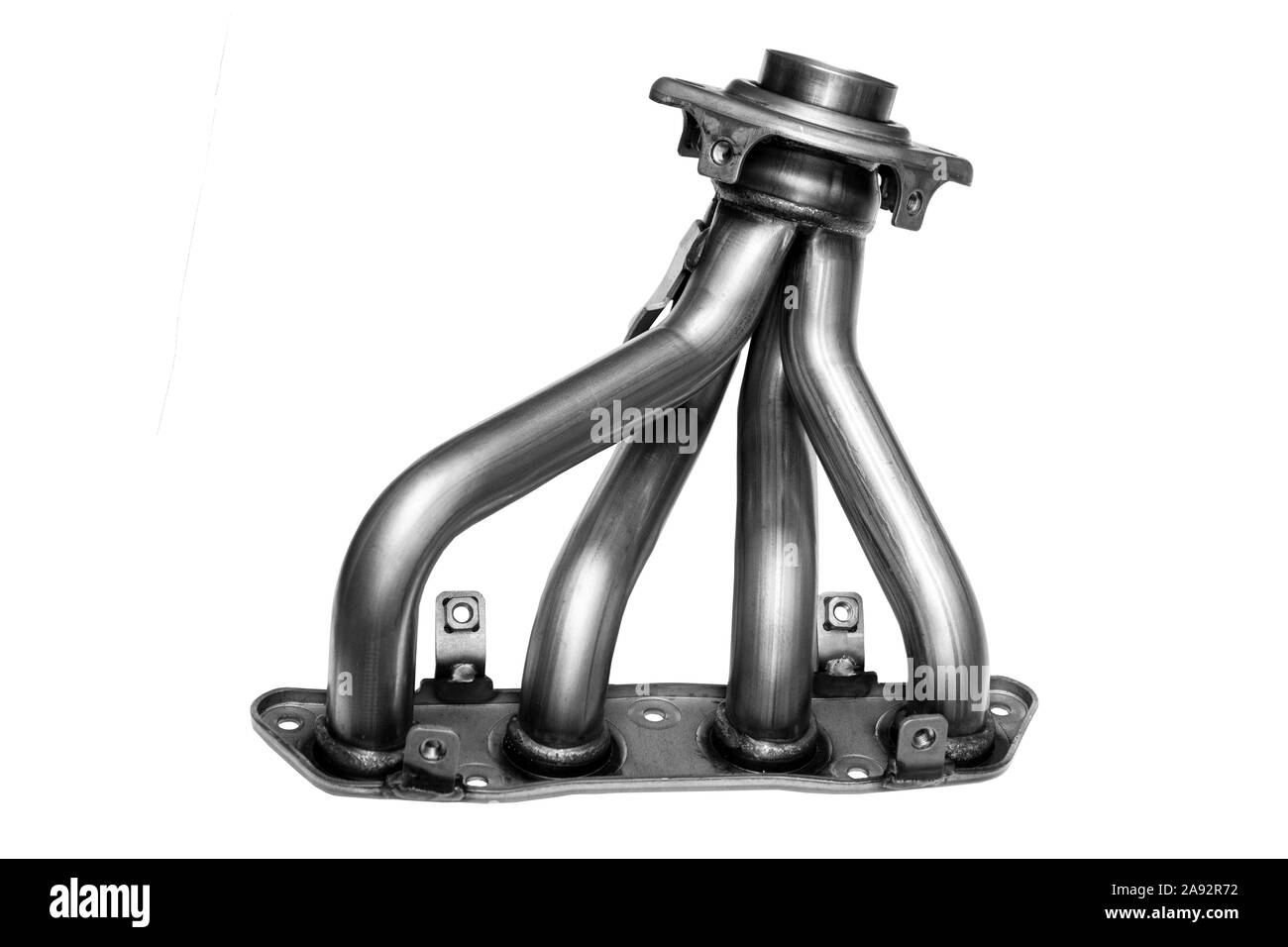 Metallic new car Auspuffkrümmer auf einem weißen Hintergrund. Die Vorderseite der Abgasanlage eines Abgas eines Verbrennungsmotors. Stockfoto