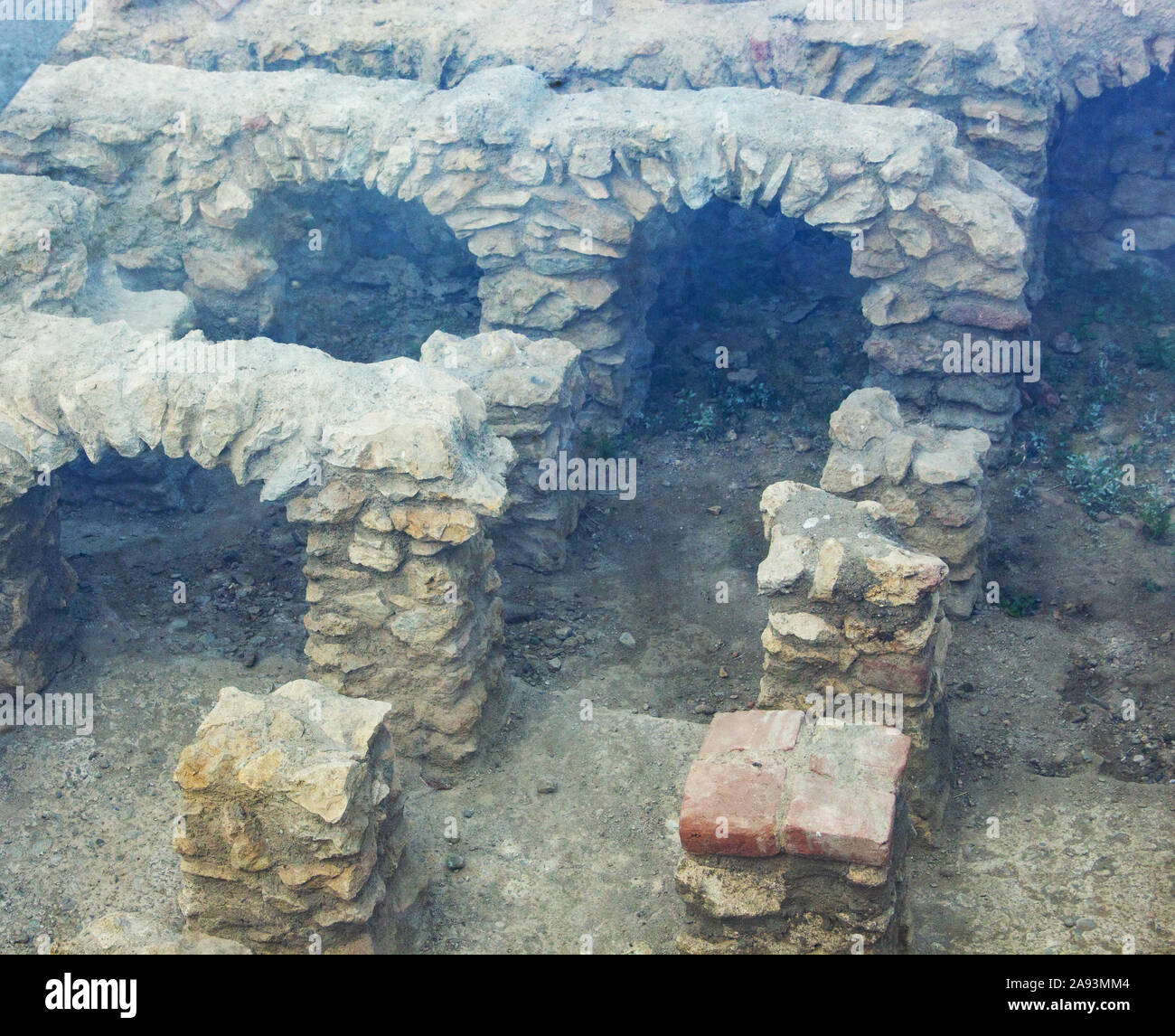 Blick auf eine antike Ausgrabung, Teil eines alten römischen Fußbodenheizung Stockfoto