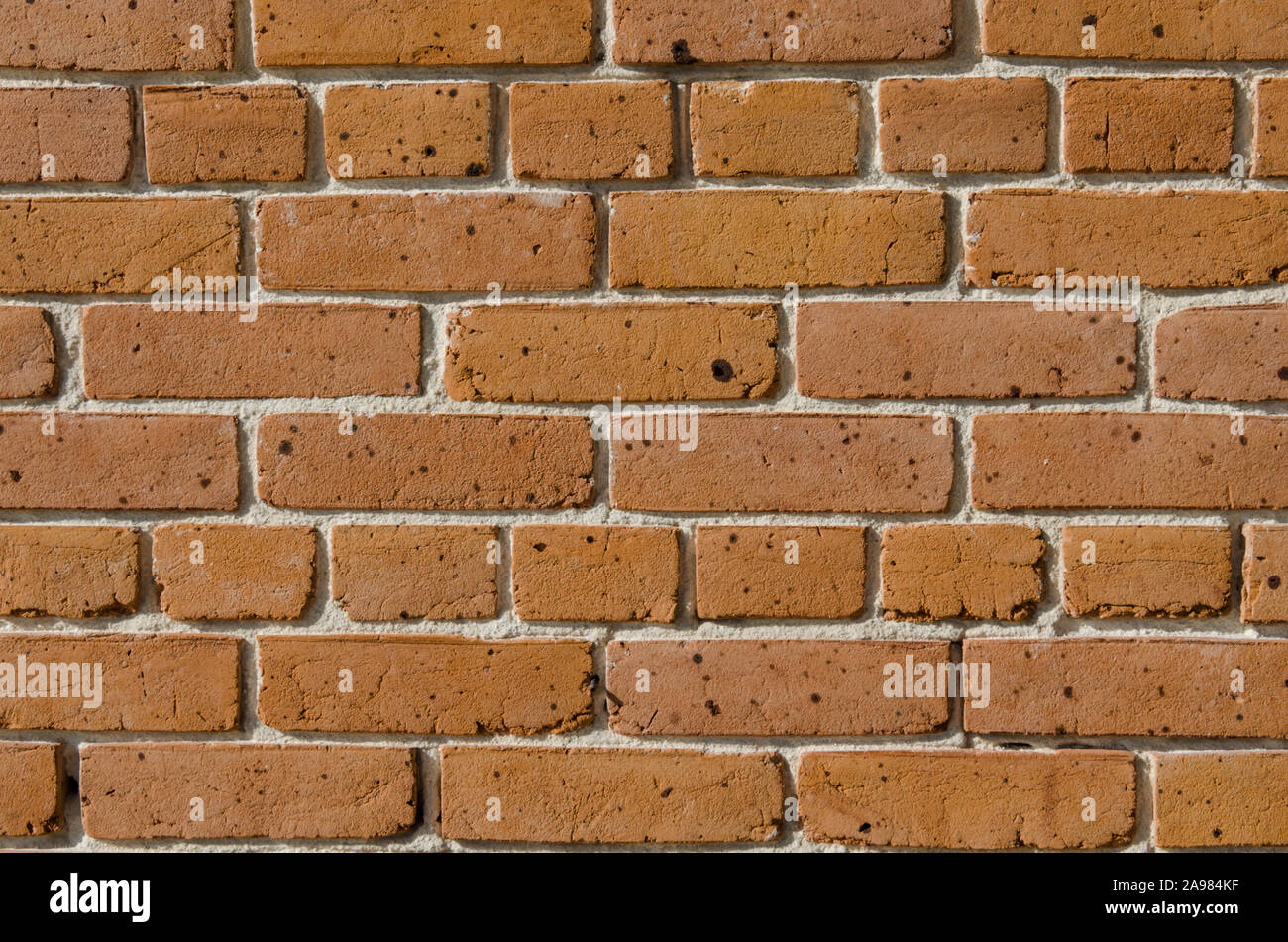 Brick Wall, ausgezeichnete rustikale Abstrakt Hintergrund oder Hintergrund. Farbe und Detail in diesem schönen Jahrgang Mauer, gebaut vor Jahren. Stockfoto