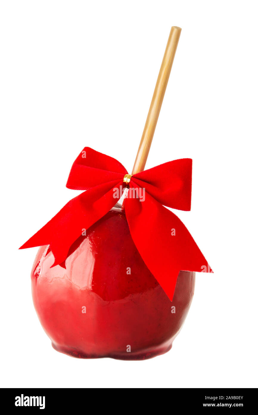 Roten kandierten Apfel vor weißem Hintergrund Stockfoto