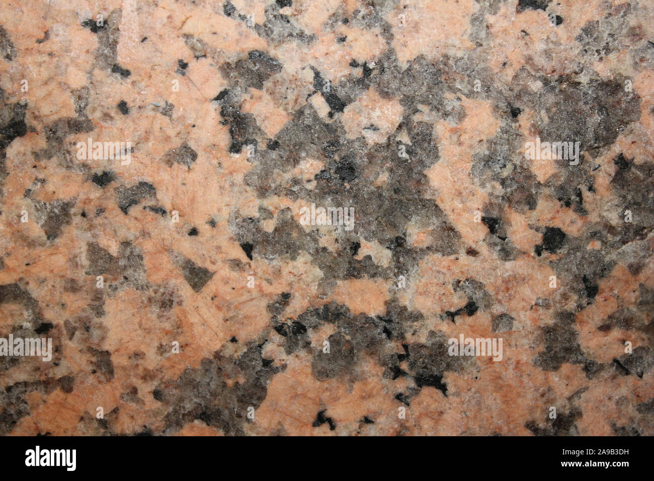 Roter Granit - eine Art von Granit reich an Mineralien Kalifeldspat (k-spar) Stockfoto