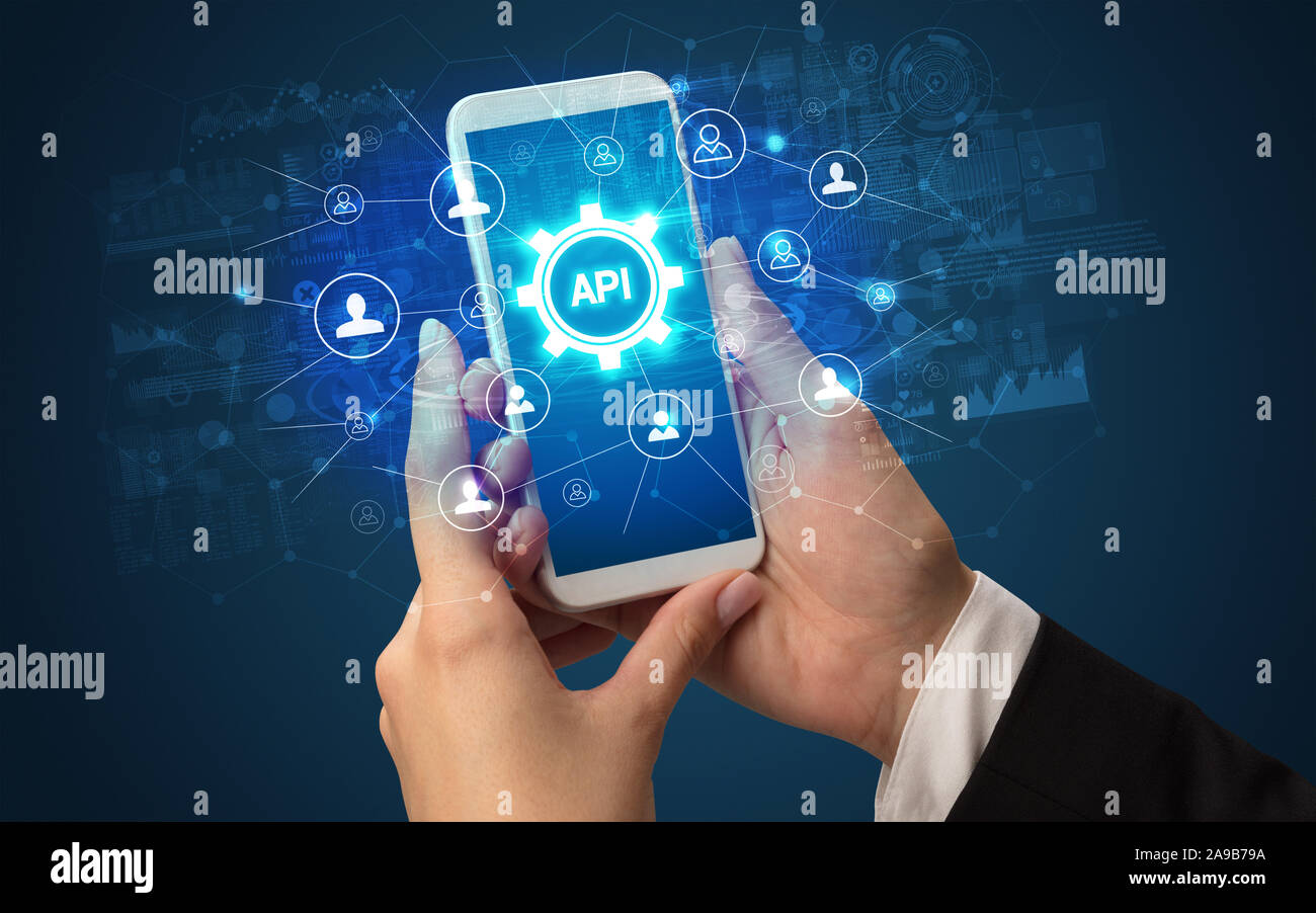 Weibliche hand Smartphone mit API Abkürzung, moderne Technologie Konzept Stockfoto