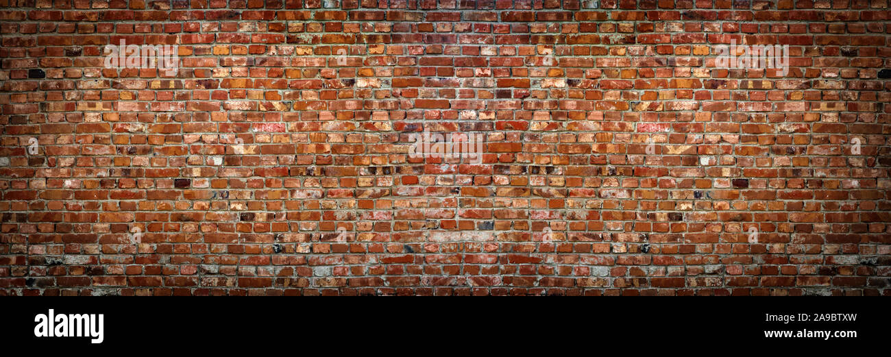 Brick Wall von roter Farbe, breites Panorama von Mauerwerk Stockfoto