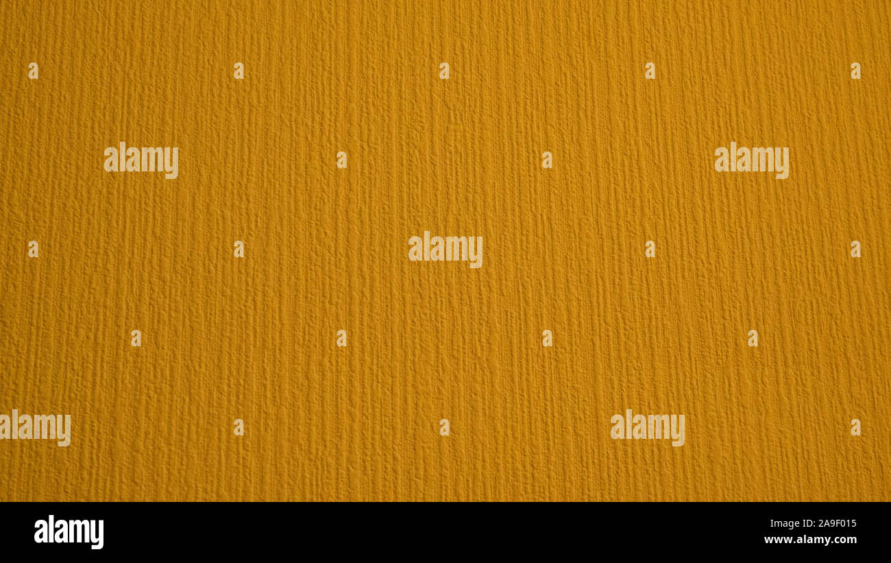Gelbe Textur. Wellen auf einem gelben Hintergrund. Stockfoto