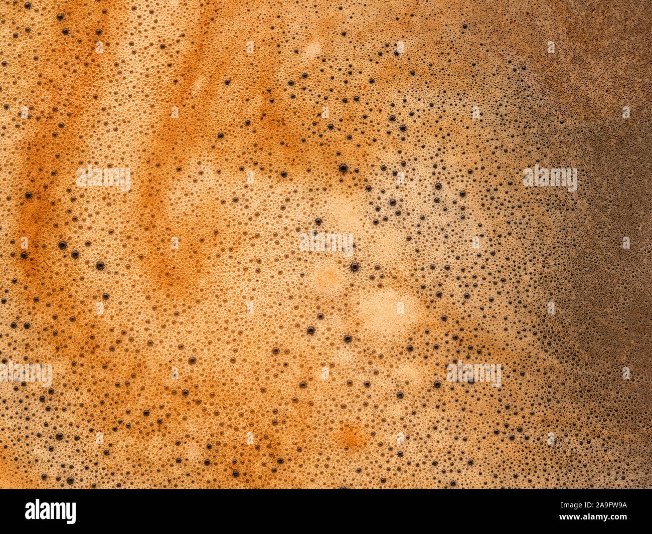 Kaffeeschaum extreme Nahaufnahme. Makro-Textur und backgroundё Stockfoto