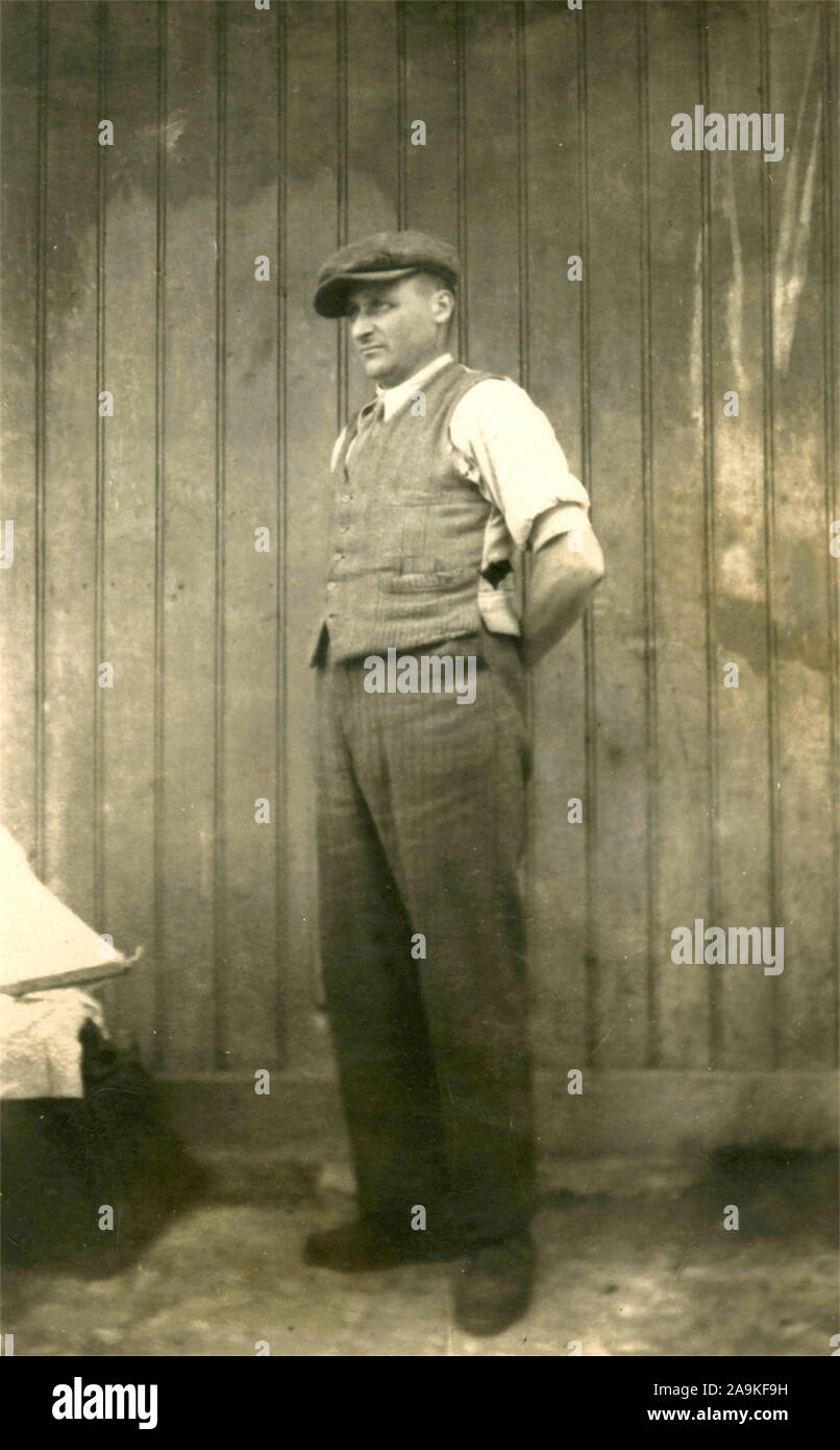 Ein Mann mit der Weste und Kappe, Italien Stockfoto