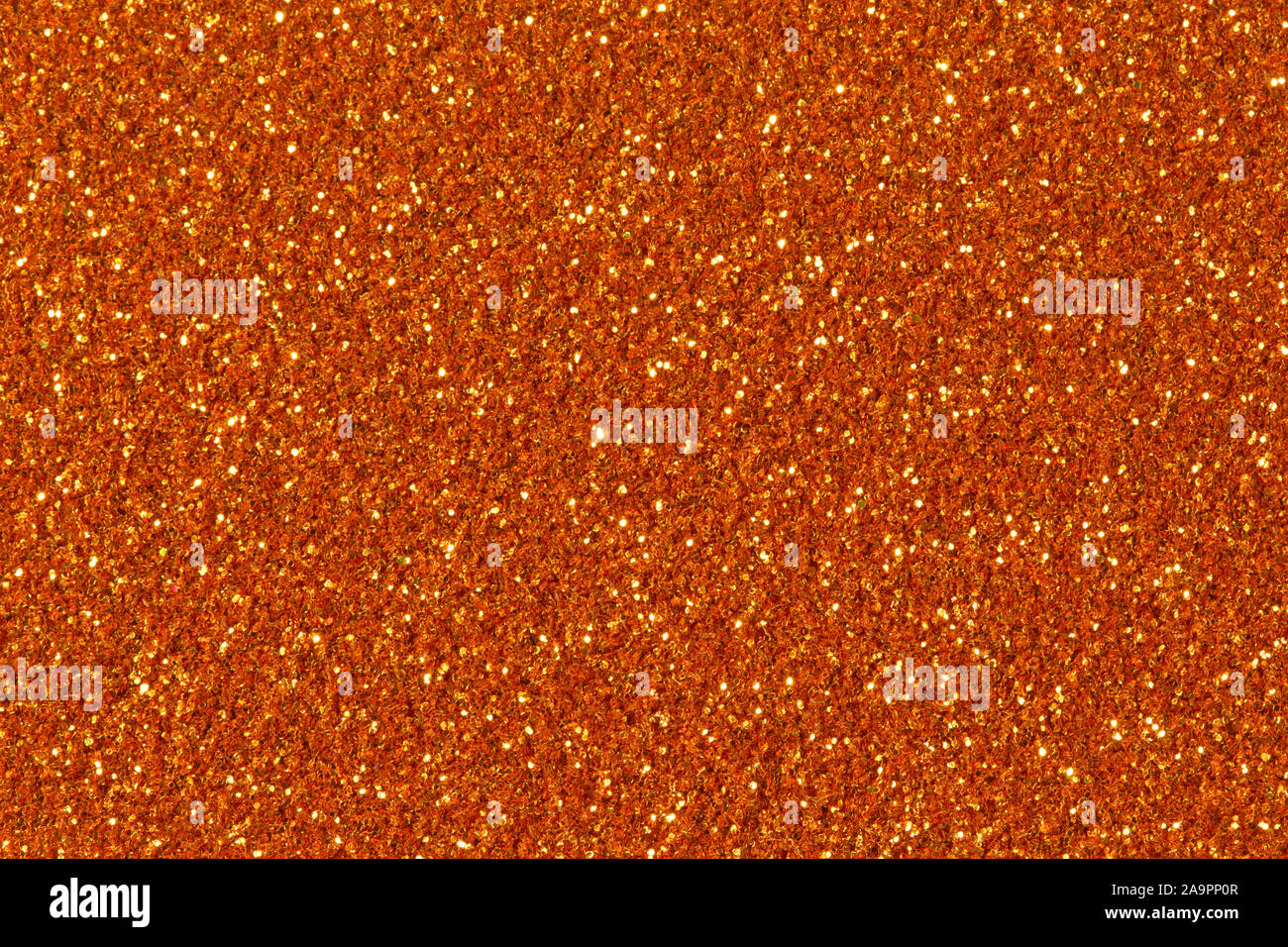 Safron glitter Textur Weihnachten Hintergrund. Hell/ Textur. Stockfoto