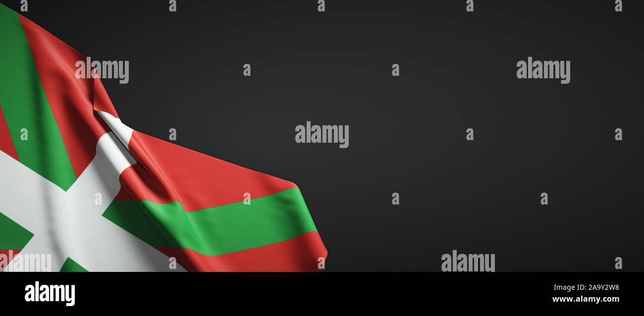 Flagge des Lappen des Baskenlandes auf dunklem Hintergrund Stockfoto