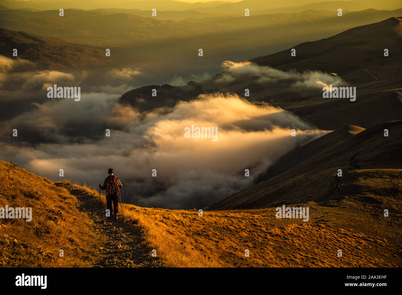 Trekking Sonnenuntergang, Nordic Walking, Mountain climber Stockfoto