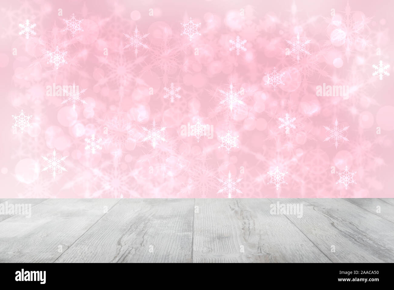 Leere Holzdeck Tabelle über abstrakte verschwommenes Licht rosa Weihnachten Hintergrund Textur mit Sternen. Für Ihr Produkt Display montage Vorlage. Schöne Stockfoto