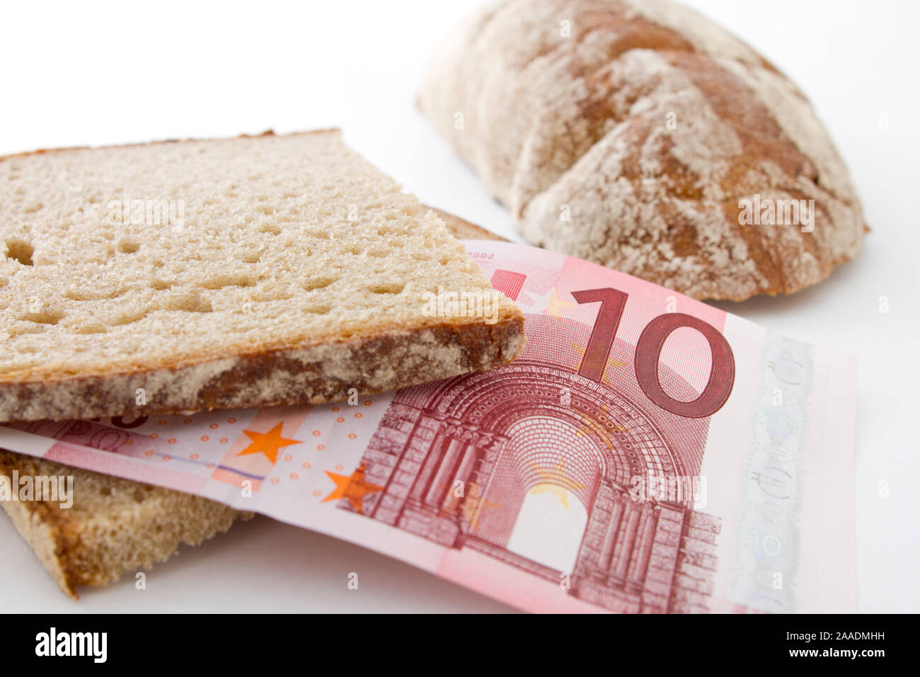 Euroschein zwischen Brotscheiben Stockfoto
