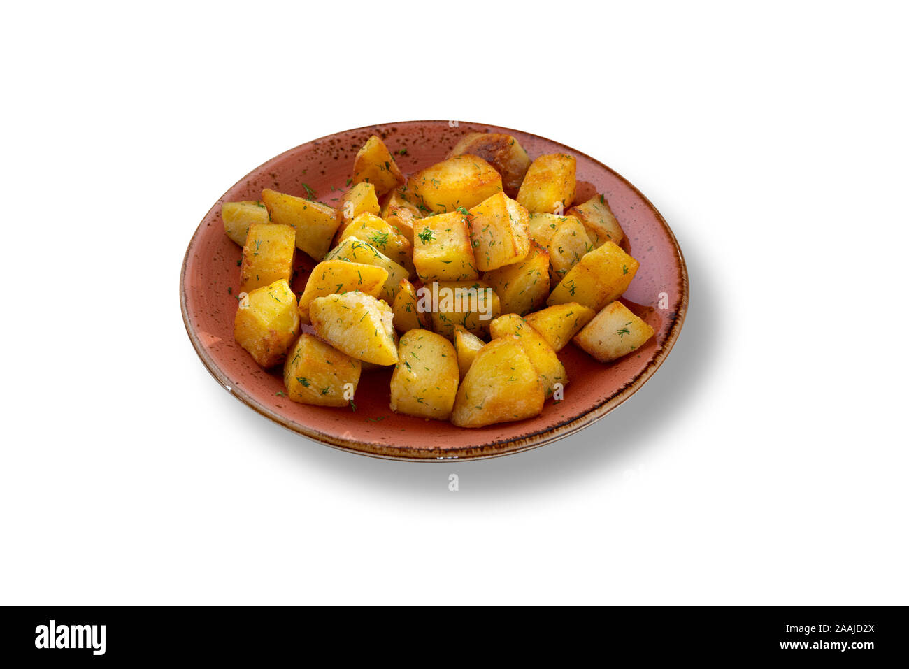 Leckere klassische gebackene Bratkartoffeln mit Gemüse und Vintage Style Platte Stockfoto
