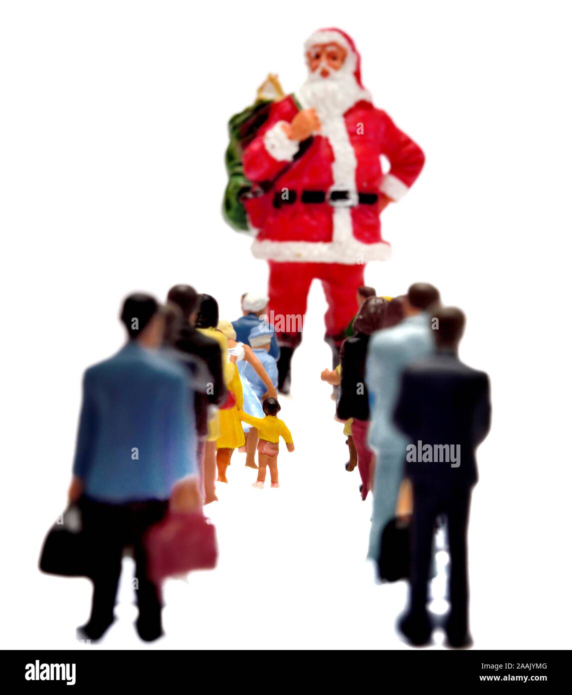 Minifigürchen queuing Santa Claus zu sehen Stockfoto