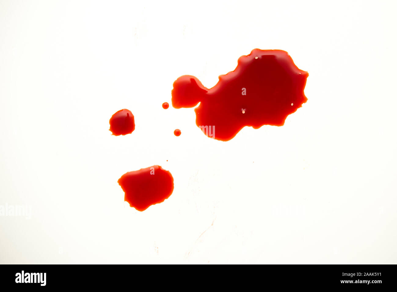 Blut tropfen isoliert Stockfoto