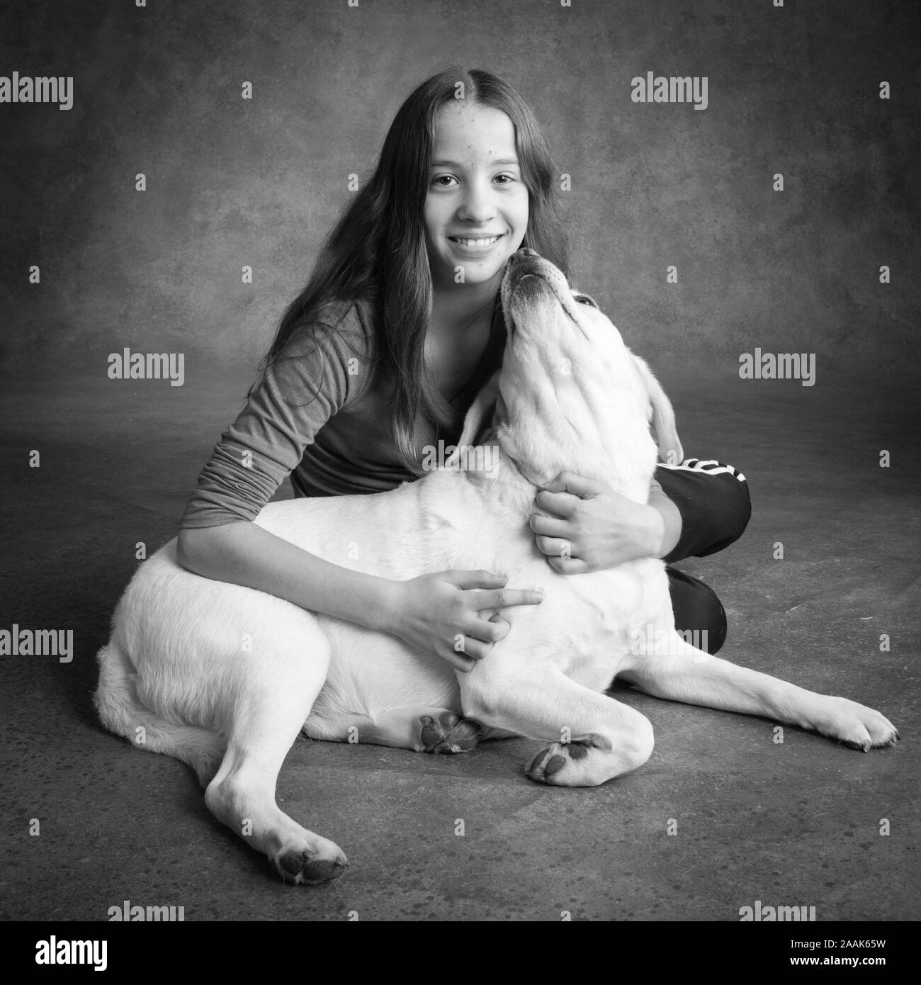 Portrait von Labrador mit Eigentümer Stockfoto